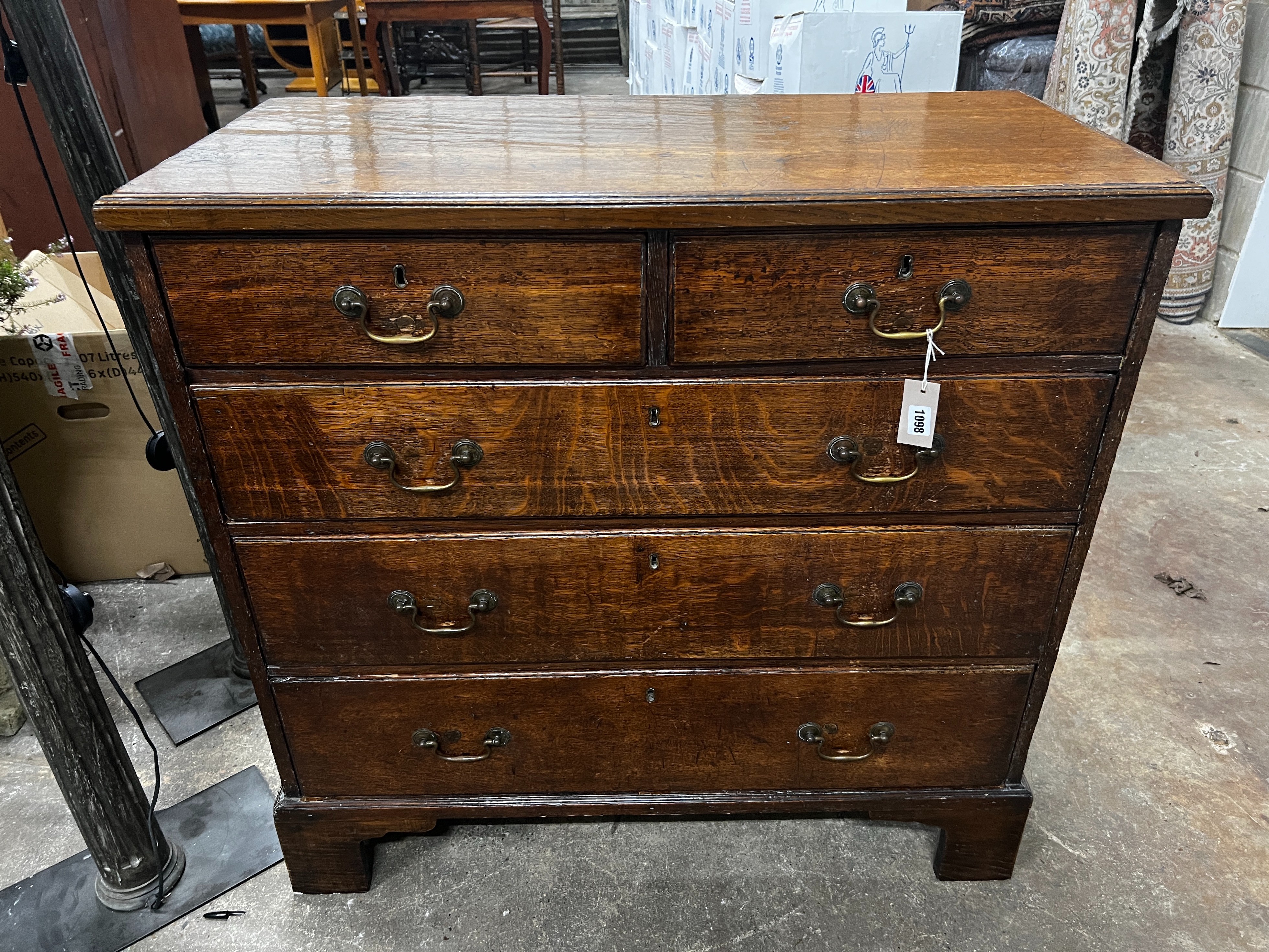 A George III oak chest of drawers, width 101cm, depth 49cm, height 98cm